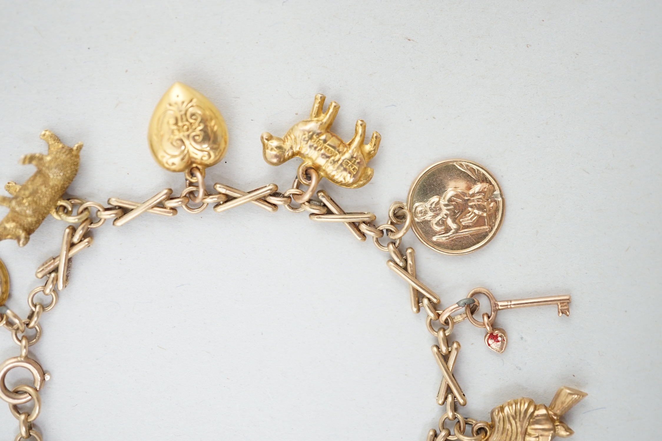 A 9ct gold charm bracelet